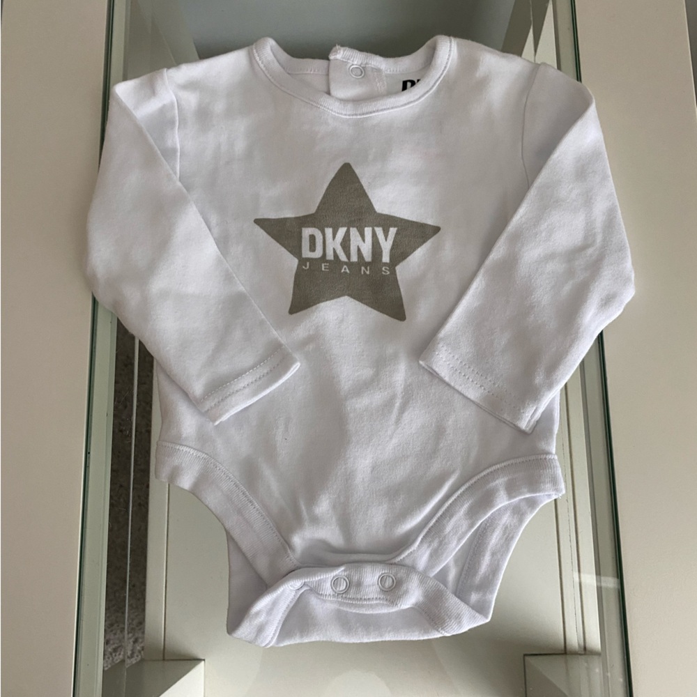 DKNY White Baby Bodysuit with Silver Star Logo